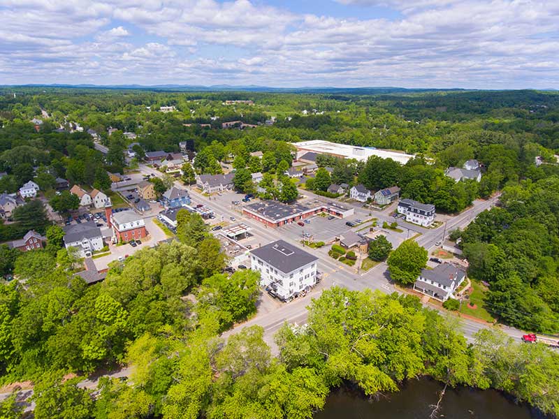 recreational cannabis dispensary near Pepperell ma - Pepperell historic town center aerial view on Main Street in summer with Nashua River at the back, town of Pepperell, Massachusetts MA, USA.